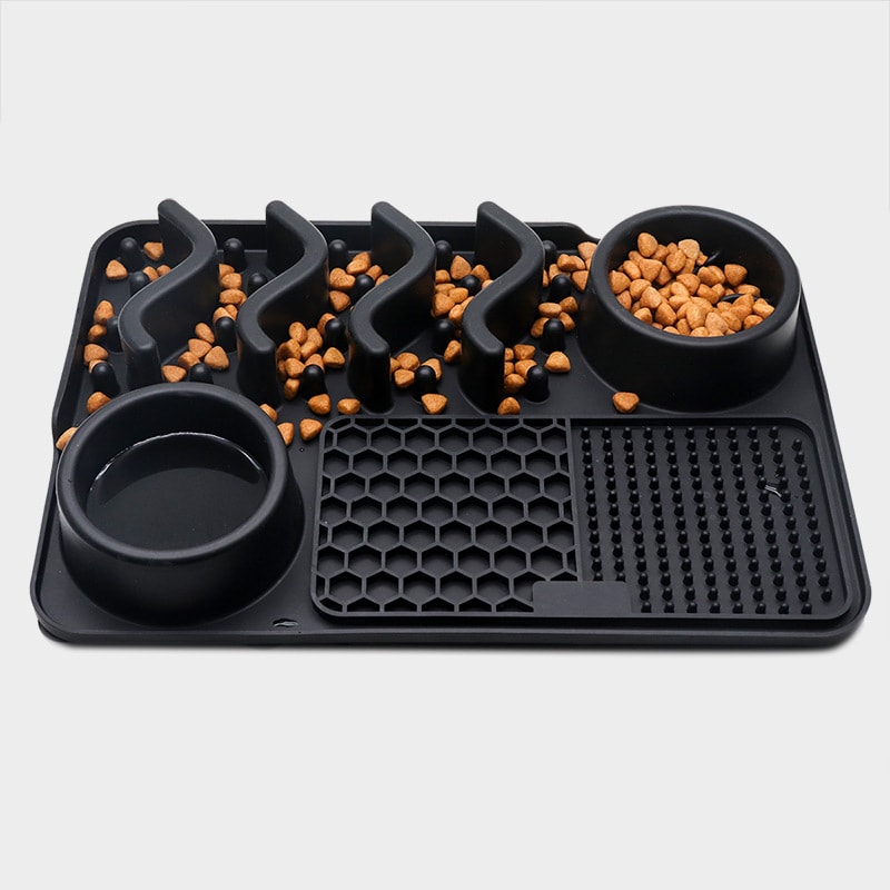 Lick & Slow Feeding Mat with kibble in the ridges and bowls